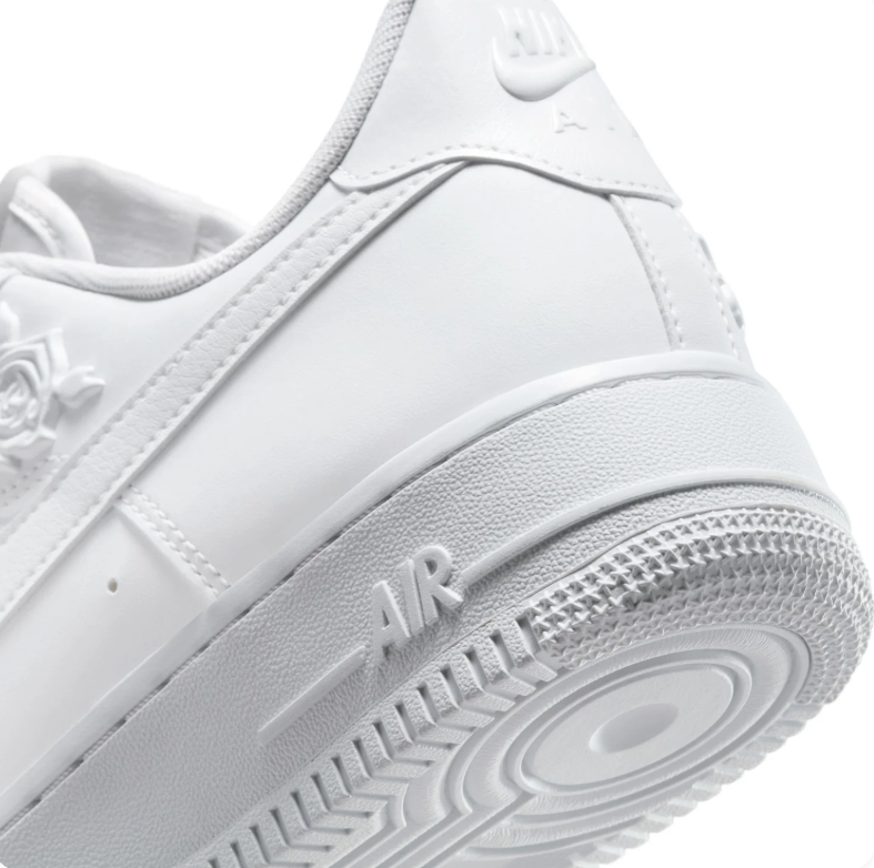 Nike All-White Low-Top Sneakers with Raised Rose Details