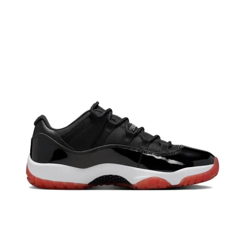 Air Jordan Black Low-Top Sneakers with Glossy Panels & Red Outsoles