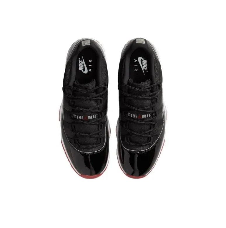 Air Jordan Black Low-Top Sneakers with Glossy Panels & Red Outsoles
