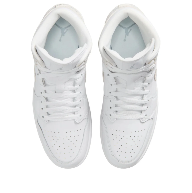 Air Jordan White Mid-Top Sneakers with Metallic Silver Accents