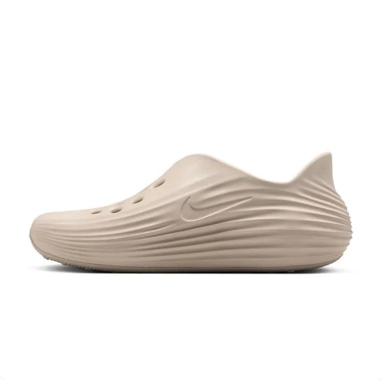 Nike Beige Slip-On Clogs with Sculpted Wave Detailing