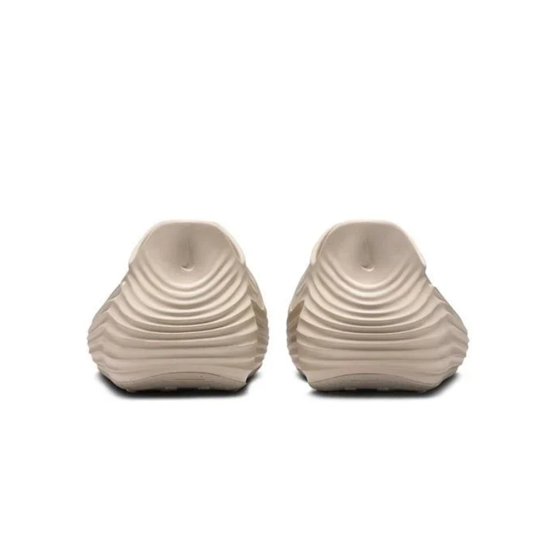 Nike Beige Slip-On Clogs with Sculpted Wave Detailing